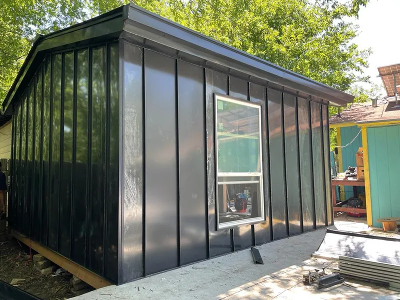 Black standing seam metal wall panels for Metal Roof Installation in Belpre