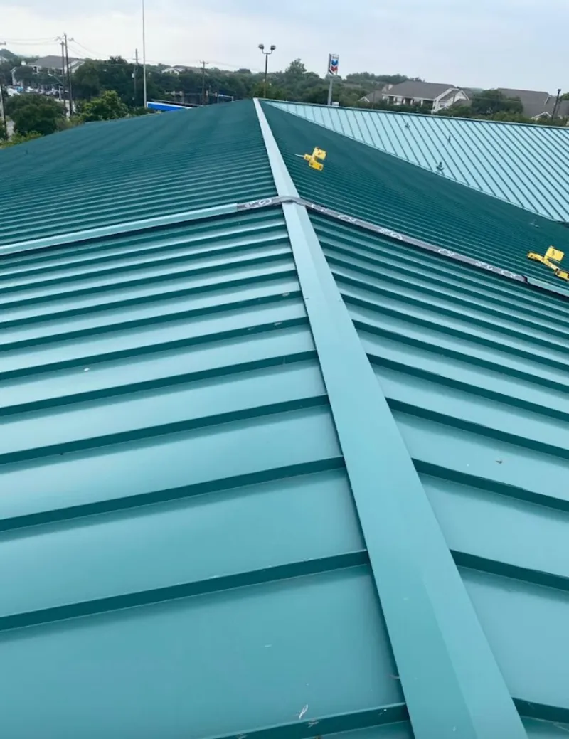 Green commercial metal roof ridge and valley for Metal Roof Repair in Belpre
