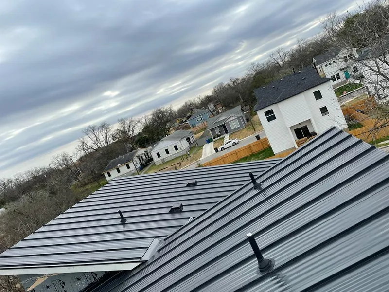 Standing seam metal roof panels with vents for Skylight Repair in Belpre